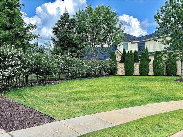 view of yard with fence