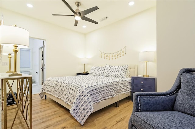 bedroom with light wood-style floors, ceiling fan, visible vents, and recessed lighting