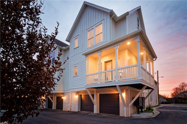 view of front of house with a garage and board and batten siding