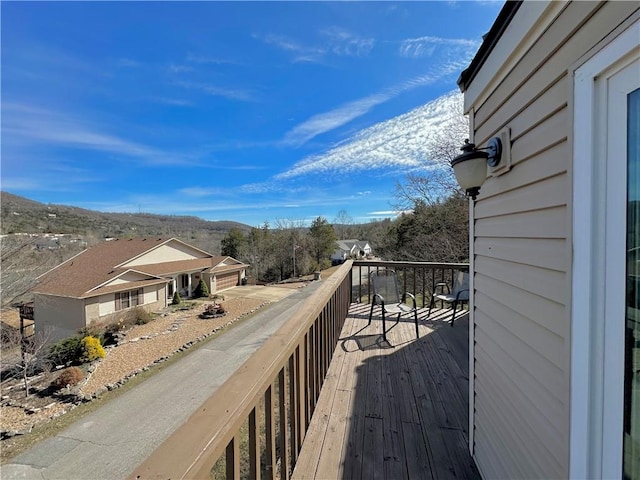 balcony featuring a mountain view