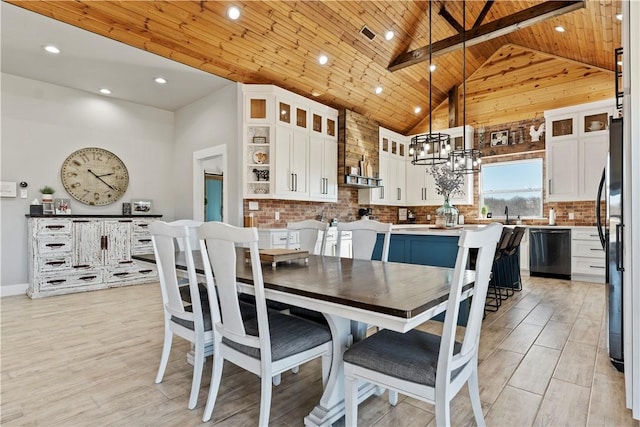 dining area featuring wooden ceiling, an inviting chandelier, light wood-type flooring, high vaulted ceiling, and recessed lighting