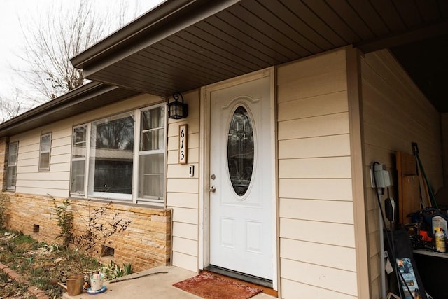 view of exterior entry with crawl space