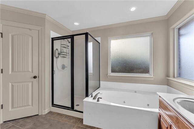 115 NE Lake Forest Ln, Bentonville, AR 72712 - bathroom with a whirlpool tub, a shower stall, ornamental molding, and tile patterned floors