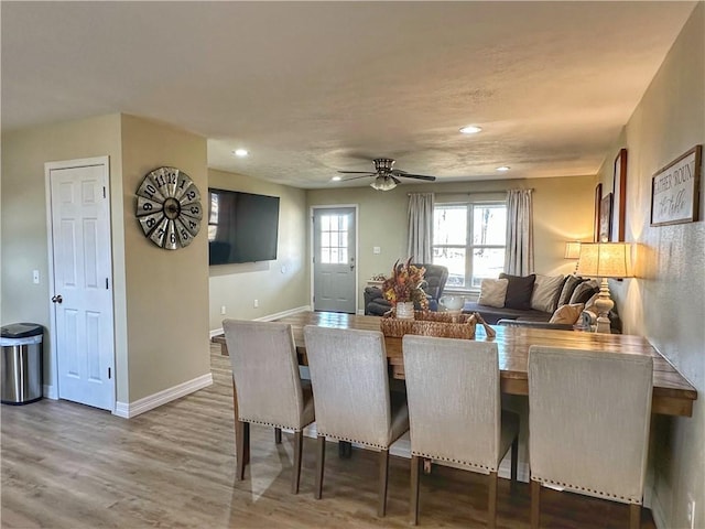 dining area with recessed lighting, ceiling fan, baseboards, and wood finished floors