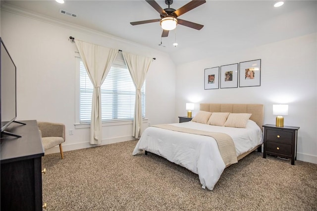 carpeted bedroom featuring lofted ceiling, recessed lighting, visible vents, a ceiling fan, and baseboards