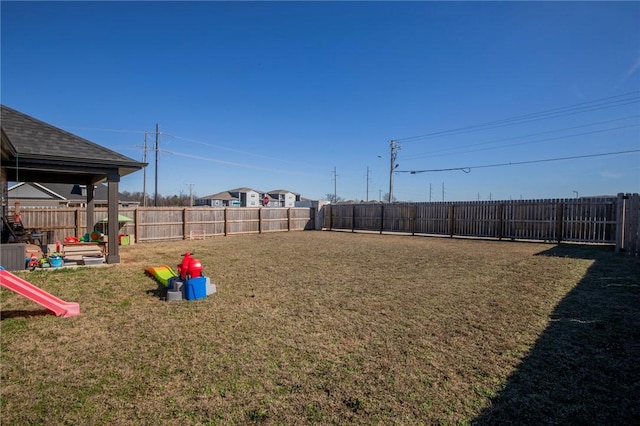 view of yard featuring a fenced backyard