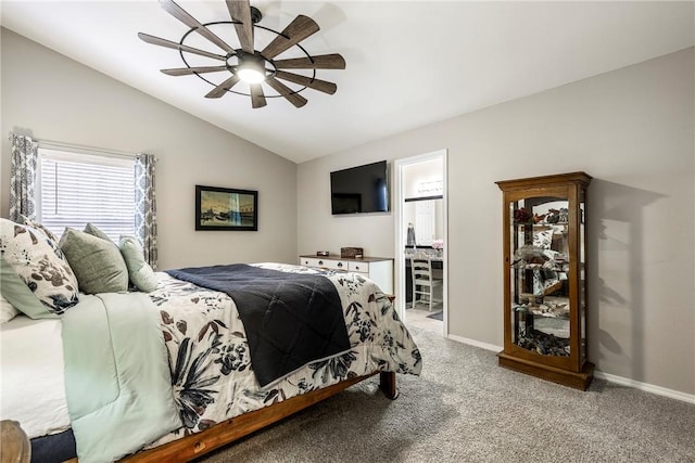 bedroom with vaulted ceiling, ceiling fan, baseboards, and light colored carpet