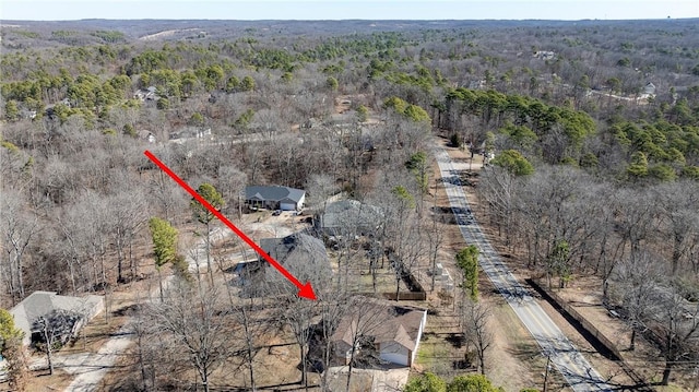 drone / aerial view with a view of trees