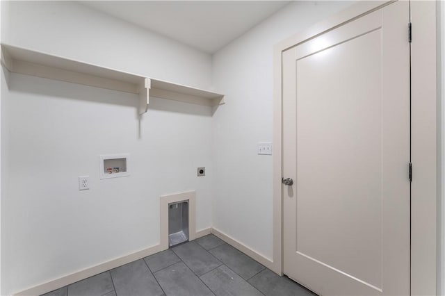 clothes washing area featuring hookup for a washing machine, electric dryer hookup, laundry area, baseboards, and tile patterned floors