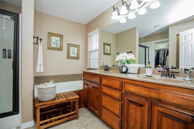 full bath featuring visible vents, a stall shower, a sink, tile patterned flooring, and a bath