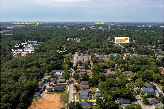 drone / aerial view featuring a view of trees