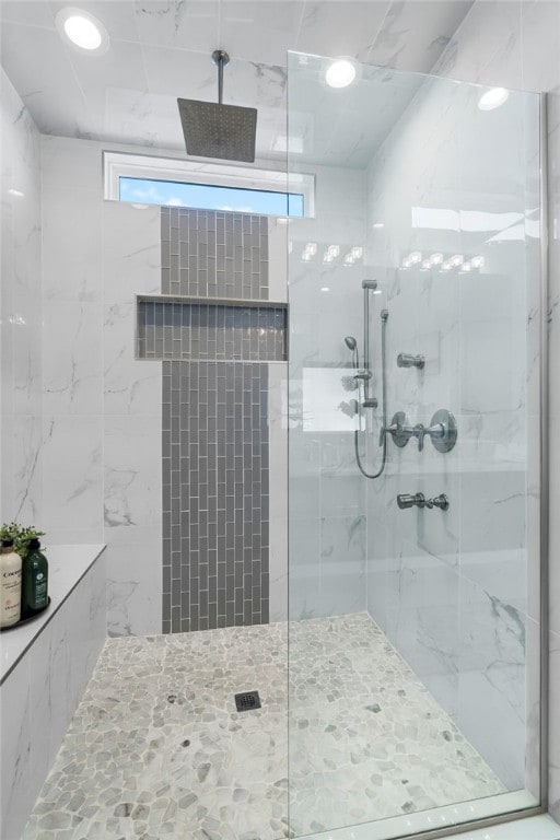 bathroom with a walk in shower