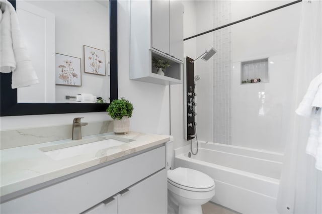 full bath with vanity, bathtub / shower combination, and toilet