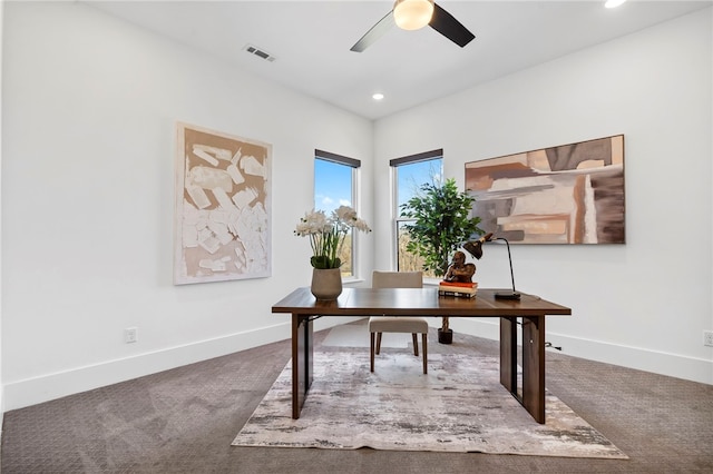 office with carpet, visible vents, and baseboards