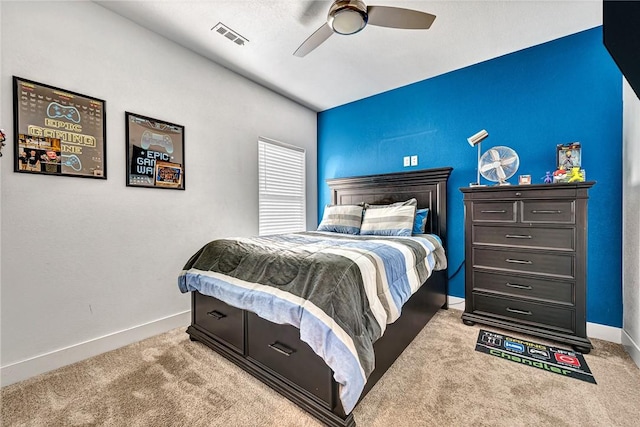 carpeted bedroom with visible vents, ceiling fan, vaulted ceiling, and baseboards