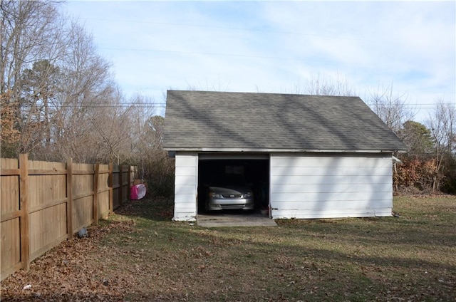 detached garage with fence