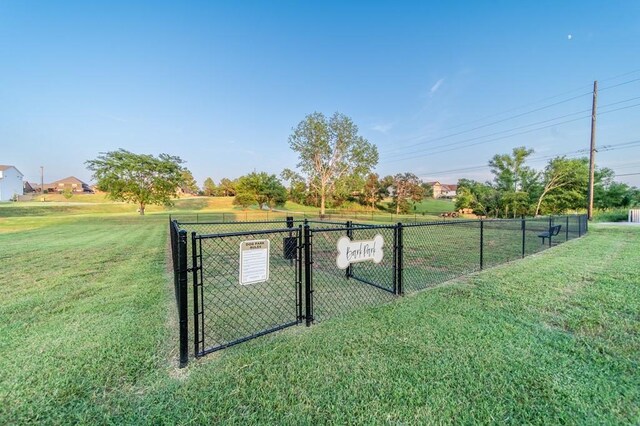 exterior space with a gate and fence