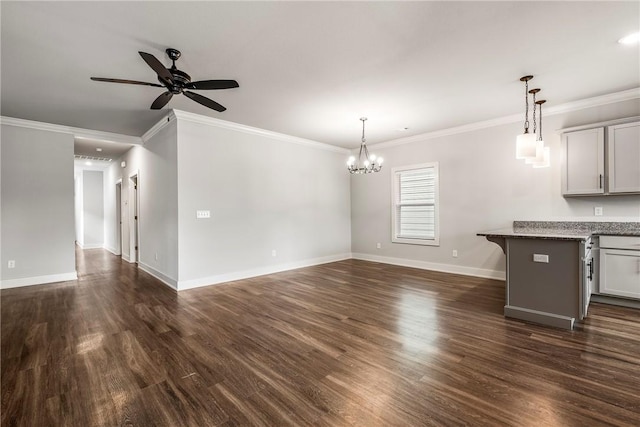 interior space featuring dark wood-style floors, baseboards, and ceiling fan with notable chandelier