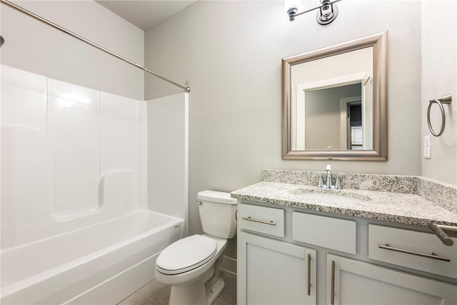 bathroom featuring bathing tub / shower combination, toilet, and vanity