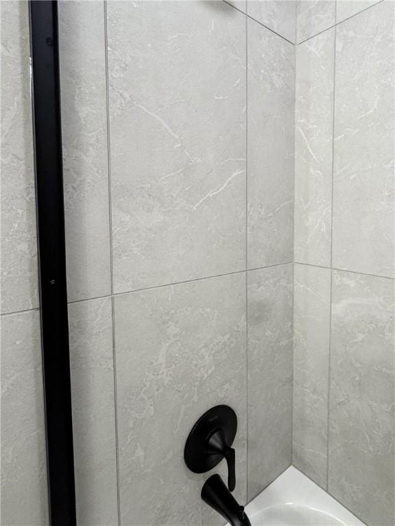 details with shower / bath combination