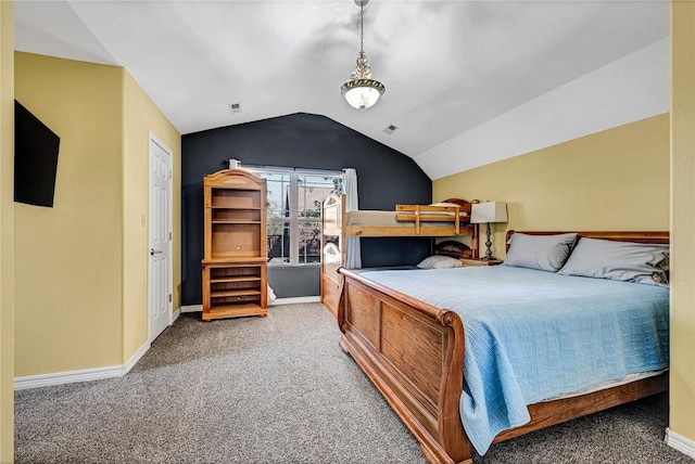 carpeted bedroom featuring visible vents, baseboards, and vaulted ceiling