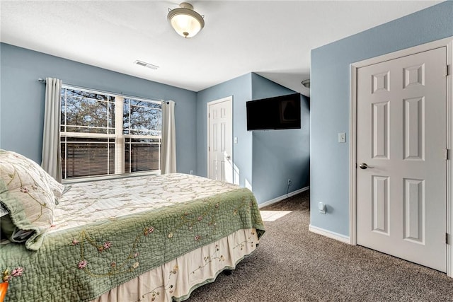 bedroom with carpet, visible vents, and baseboards