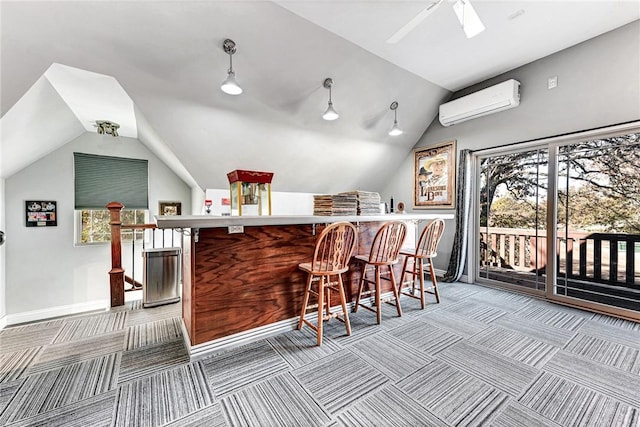 bar featuring lofted ceiling, light colored carpet, baseboards, an AC wall unit, and a dry bar