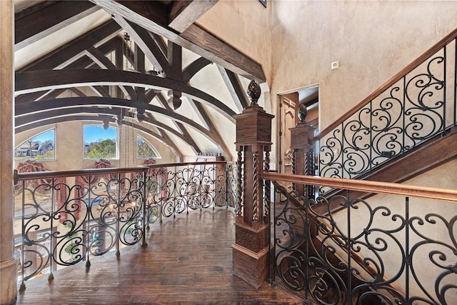 2 S Samoset Ct, Rogers, AR 72758 - stairs with high vaulted ceiling, beam ceiling, wood-type flooring, and ornate columns