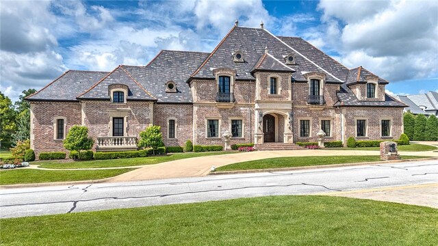 2 S Samoset Ct, Rogers, AR 72758 - french provincial home with a high end roof, brick siding, and a front lawn