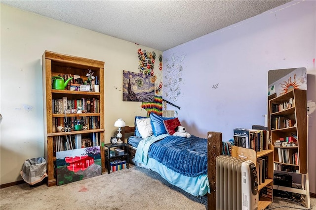 bedroom featuring a textured ceiling, carpet, and radiator