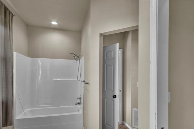 full bath with visible vents and bathing tub / shower combination