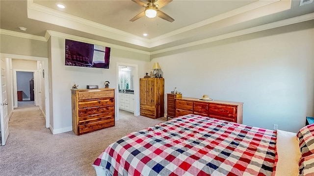 bedroom featuring light carpet, ornamental molding, a raised ceiling, and recessed lighting