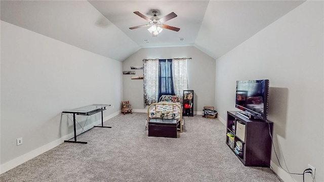 sitting room with lofted ceiling, ceiling fan, carpet floors, visible vents, and baseboards