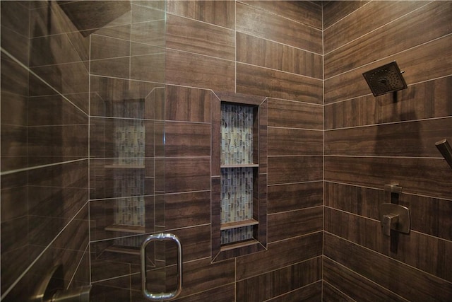 bathroom with a shower stall