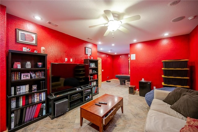 living room with recessed lighting, visible vents, a textured wall, and billiards