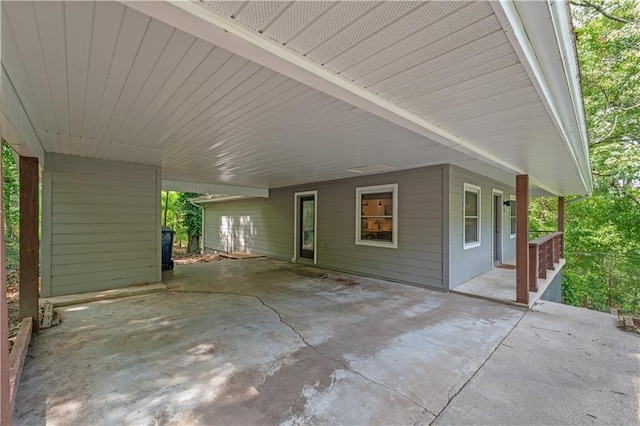 view of patio / terrace with an attached carport