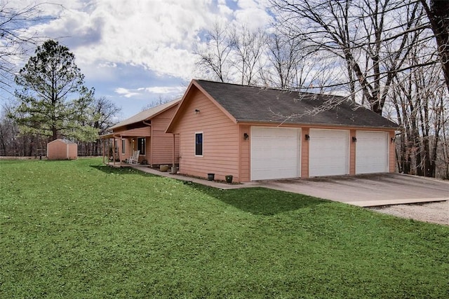 view of side of property featuring a yard, a detached garage, a storage unit, crawl space, and an outdoor structure