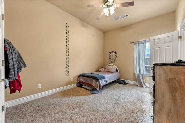 bedroom featuring carpet floors, visible vents, ceiling fan, and baseboards