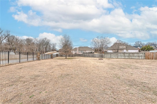 view of yard with fence