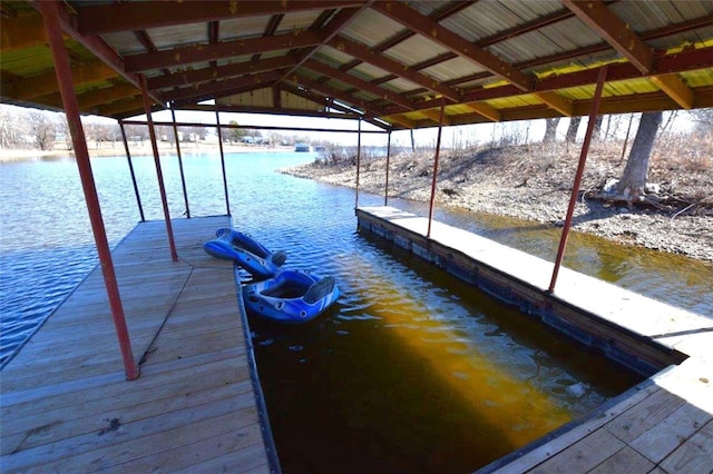 view of dock with a water view