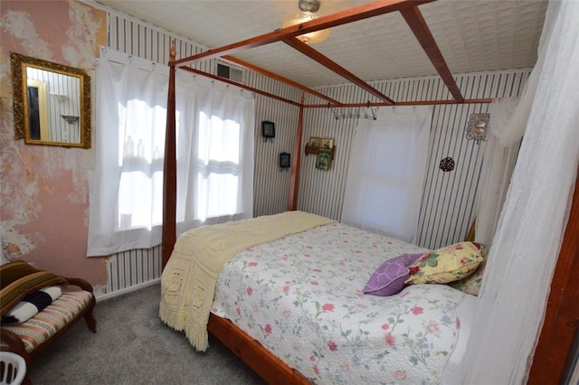 carpeted bedroom featuring radiator