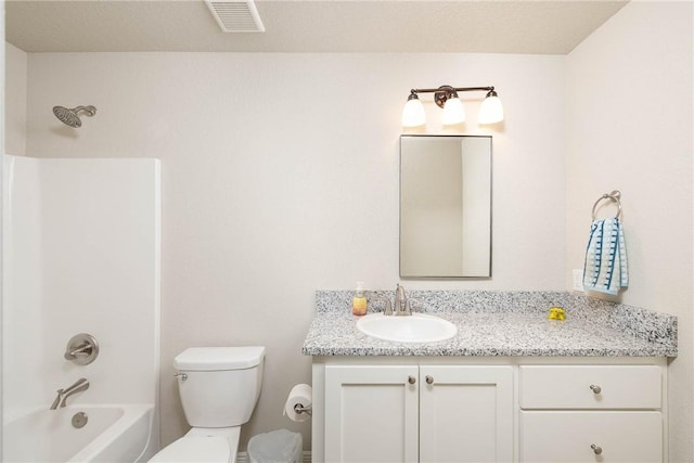 bathroom featuring toilet,  shower combination, vanity, and visible vents