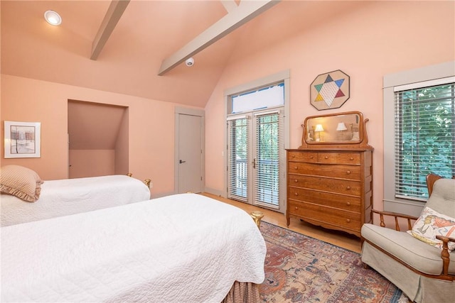 bedroom with vaulted ceiling with beams, access to outside, and wood finished floors