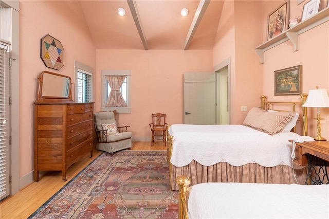 bedroom with baseboards, high vaulted ceiling, wood finished floors, and recessed lighting