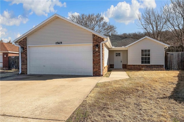 single story home with fence, driveway, a shingled roof, a garage, and brick siding