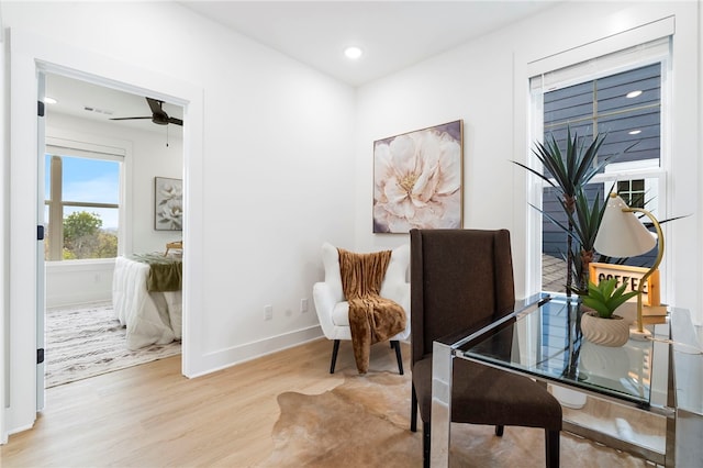 home office with ceiling fan, recessed lighting, wood finished floors, and baseboards