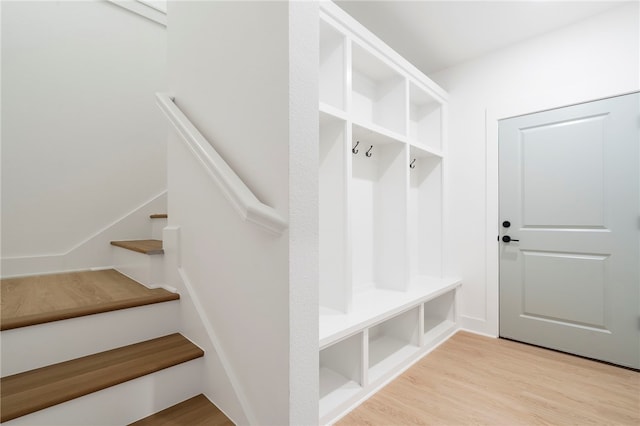 mudroom with wood finished floors