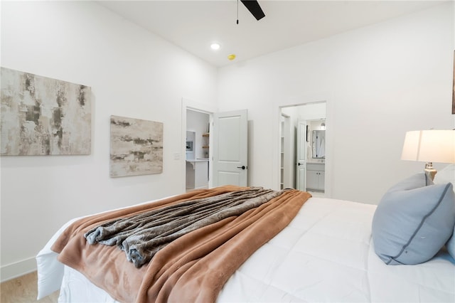 bedroom with ceiling fan, connected bathroom, and recessed lighting