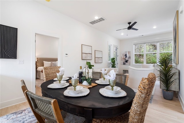 dining area with recessed lighting, light wood-type flooring, visible vents, and a ceiling fan