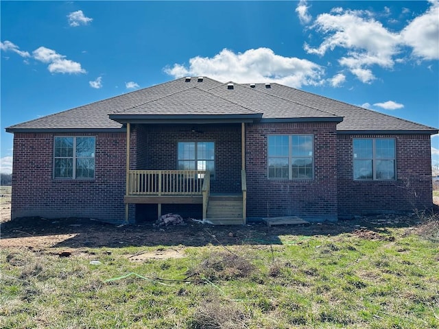 2550 Peterson Rd, Gentry, AR 72734 - rear view of house with brick siding, a lawn, and a shingled roof